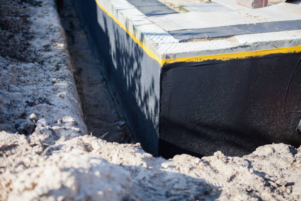 Professional Waterproofing technician working in Vineland, NJ